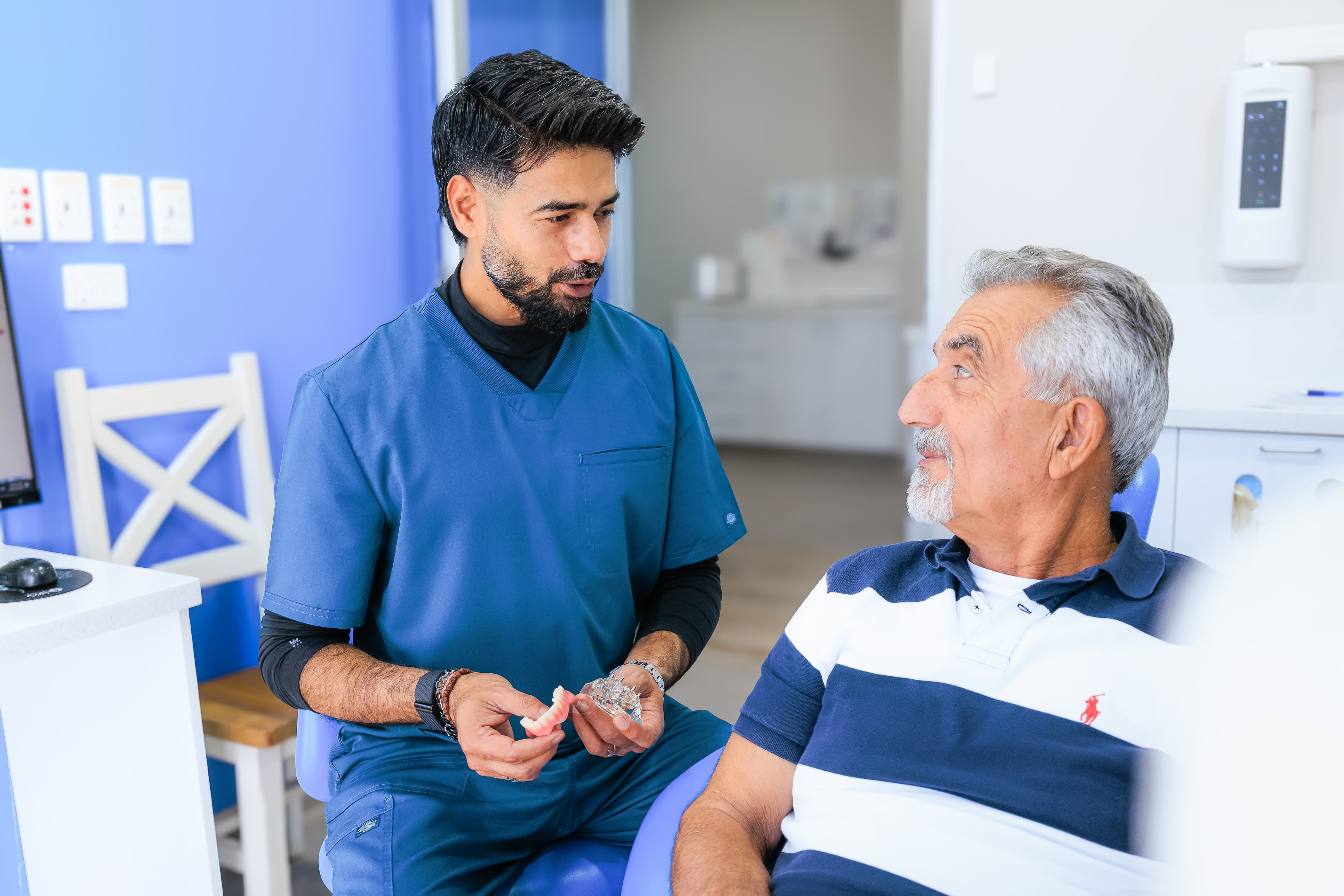 Dentist and patient reviewing a personalised dental treatment plan at Sienna Smiles